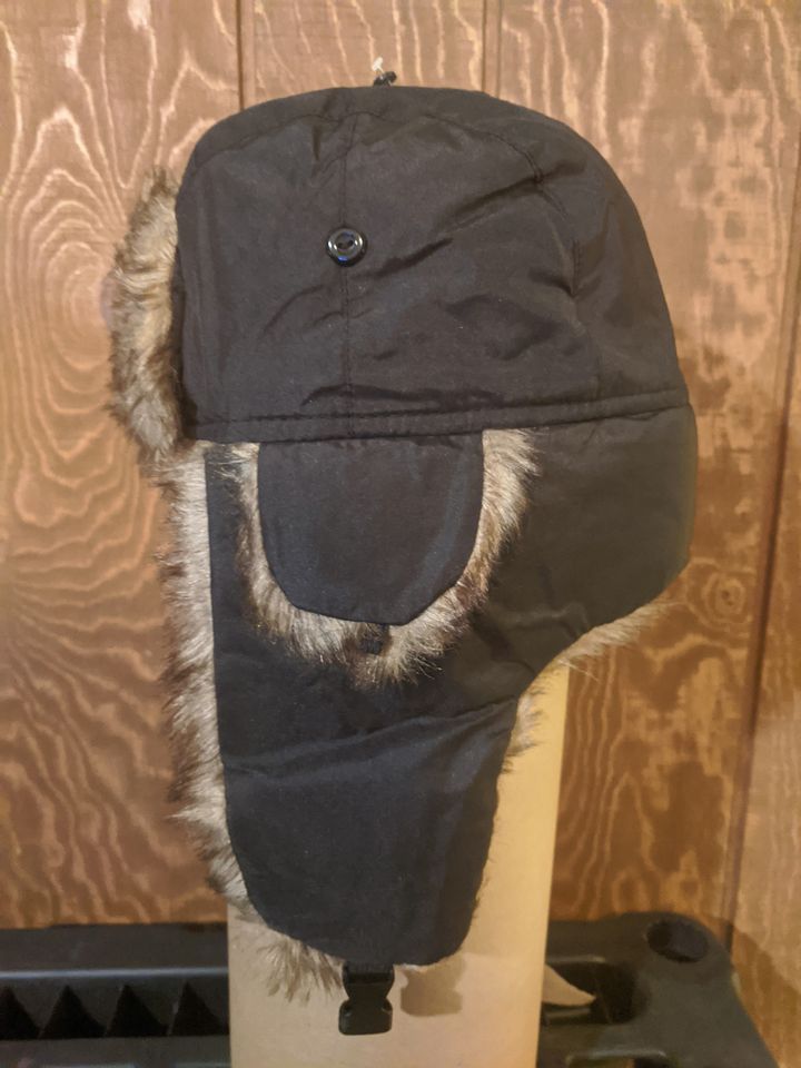 Winter cap with ear coverings - trapper hat