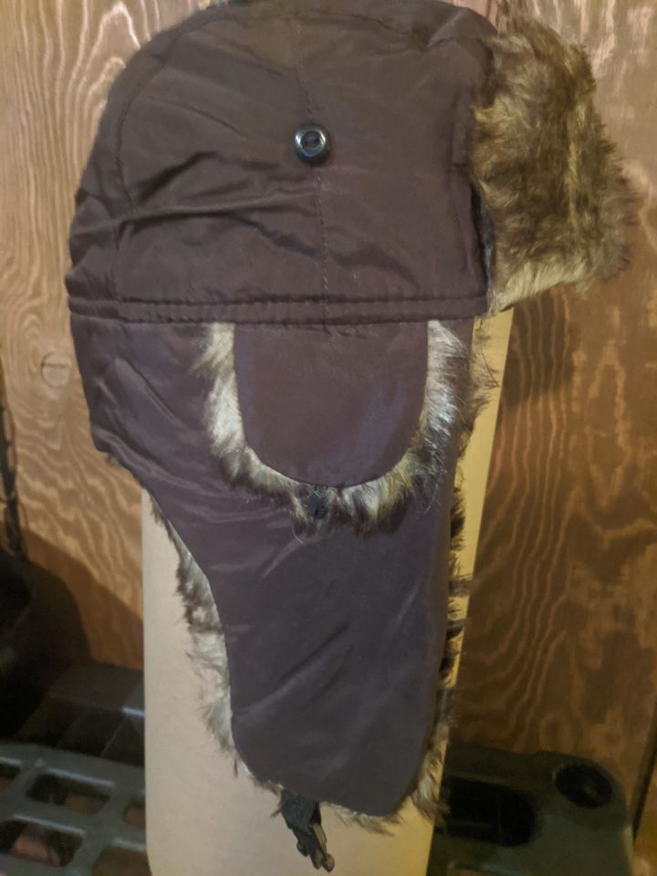 Winter cap with ear coverings - trapper hat
