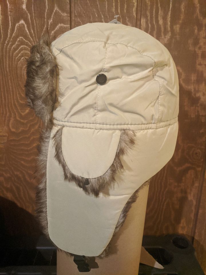 Winter cap with ear coverings - trapper hat