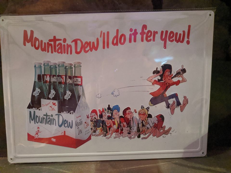 Mountain Dew'll do it fer yew! 17x12" Tin Sign