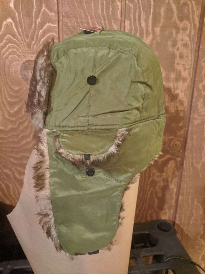 Winter cap with ear coverings - trapper hat