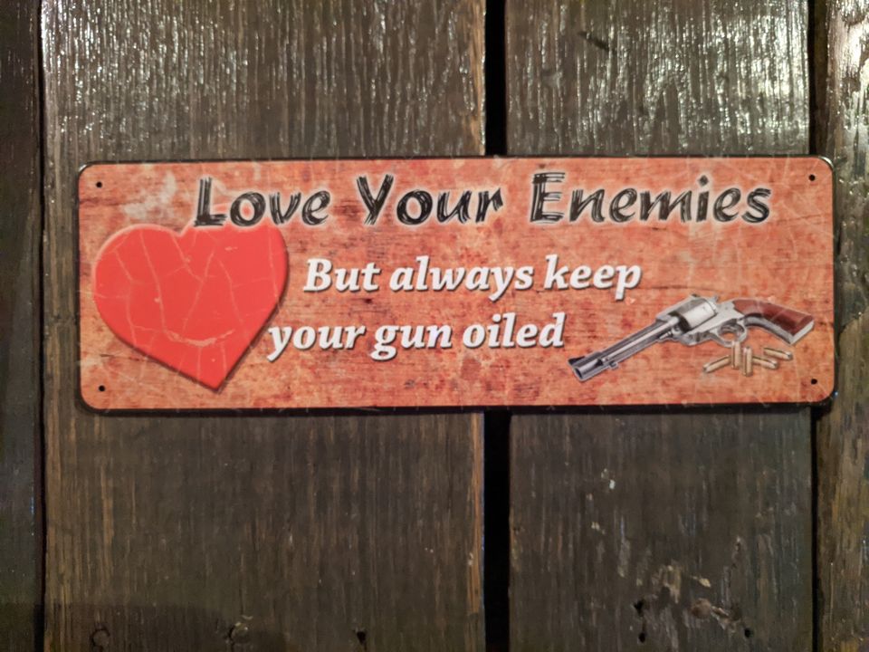 Love your Enemies - Keep your gun oiled Tin Sign 10.5" x 3.5"